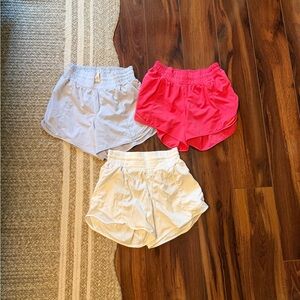 Lot Lululemon 4 inch hottie hot shorts size 2 blue, pink, White